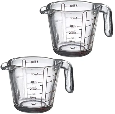Westmark 305522E3 - Juego de 2 vasos medidores (40 ml, 4 escalas diferentes, aptas para horno, microondas, congelador, transparente/negro)